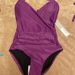 One piece purple bathing suit